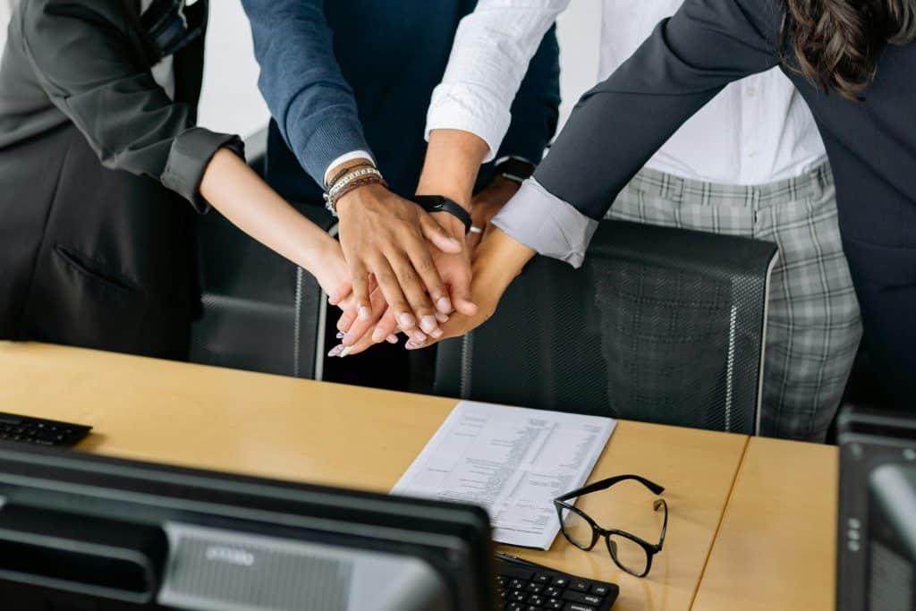 From Local to Global: The Operational Shift Inside Private Equity Firms Private equity professionals discussing cross-border investment operations and international business expansion