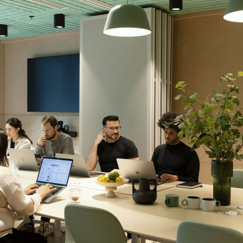 ChatGPT vs Gemini vs Claude: Which AI Tool Is Best for UK Businesses? Executive comparison of ChatGPT, Google Gemini, and Anthropic Claude interfaces on laptop screens in a London office. best ai tool for uk business